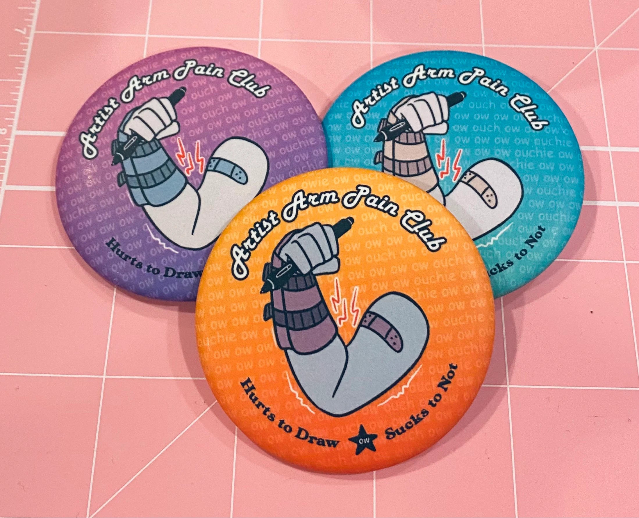 Artist Arm Pain Club Buttons
